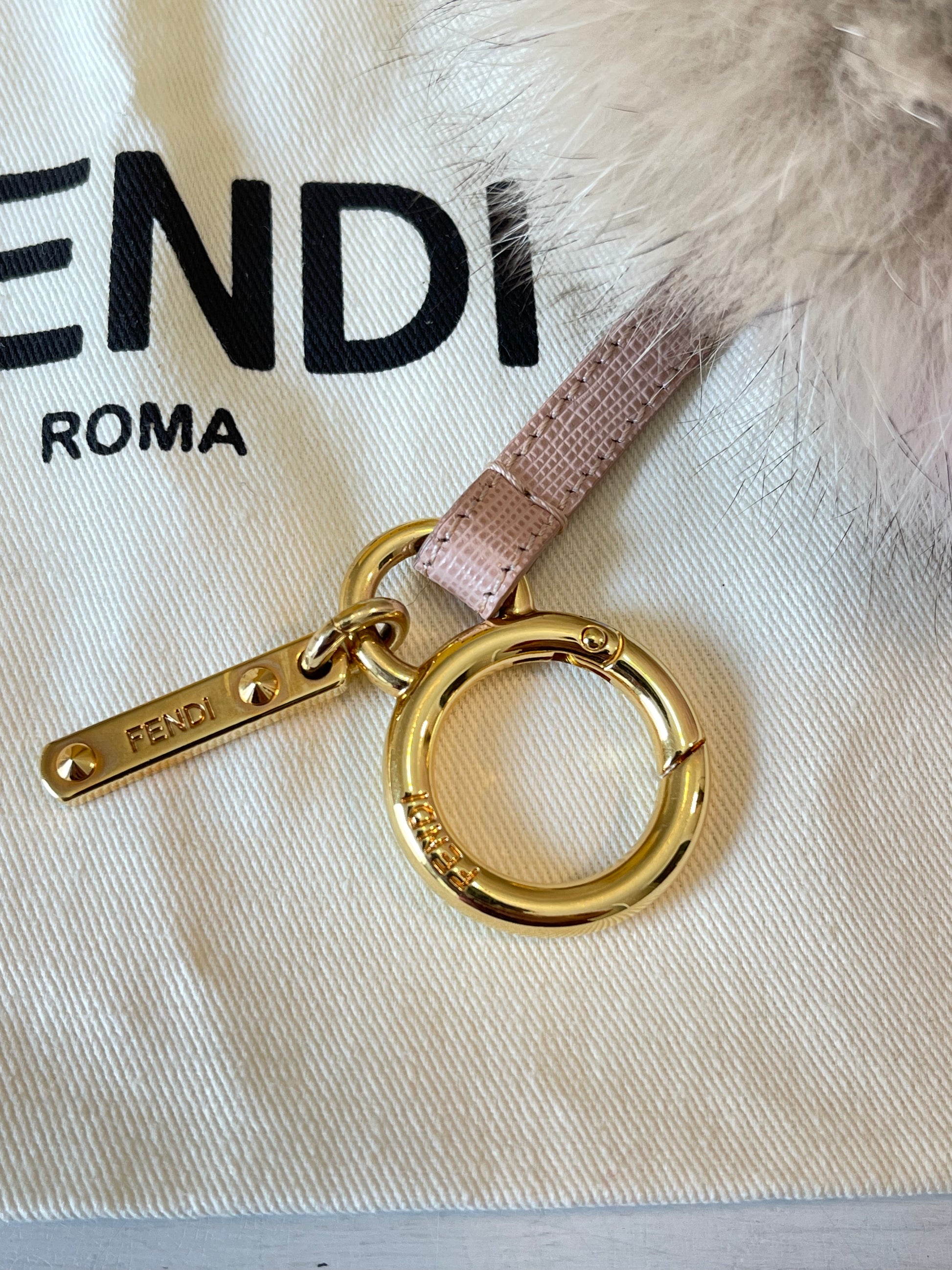 Currently craving: Fendi letter pompom fox-fur bag charms - LaiaMagazine